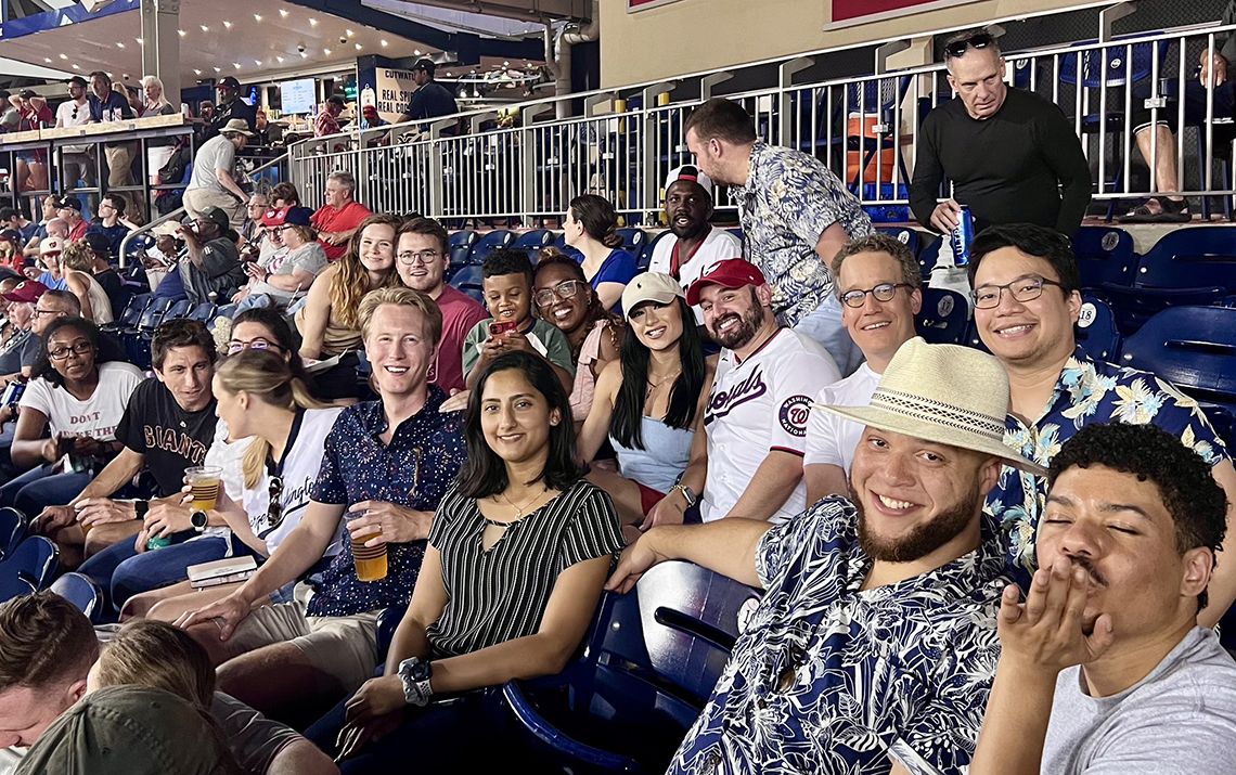 group photo of residents at a baseball game